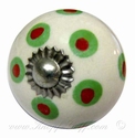 Porcelain doorknob spotted green/red